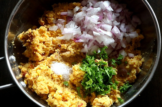 add onion, salt and coriander leaves to it
