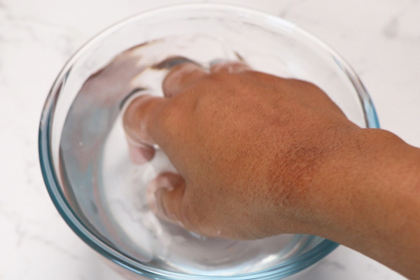 rinse hand with water