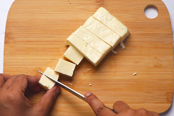 the paneer cubes are cut into small bite sized cubes