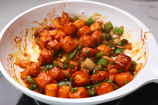 paneer is tossed until coated well