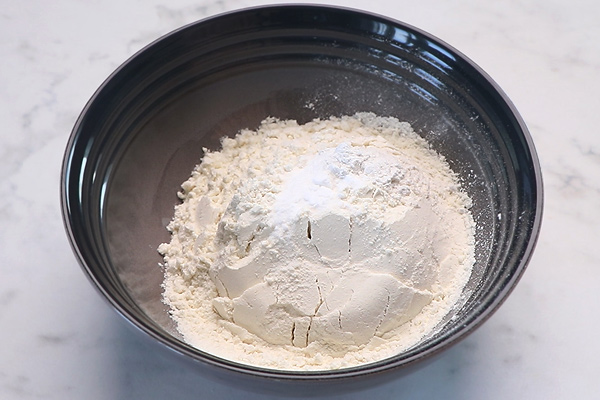 add in flour along baking powder and baking soda.