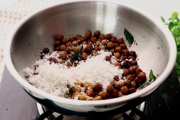add masala powder, coconut