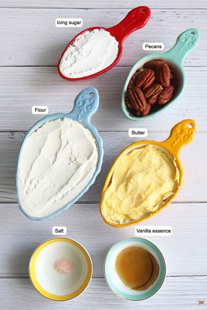 a display of ingredients needed to make snowball cookies