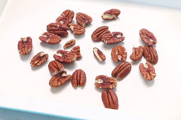 add pecans to a baking tray