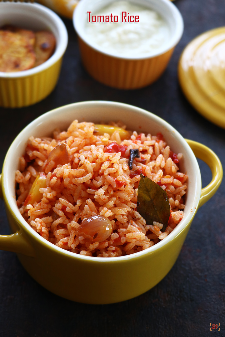 tomato rice in a yellow casserole