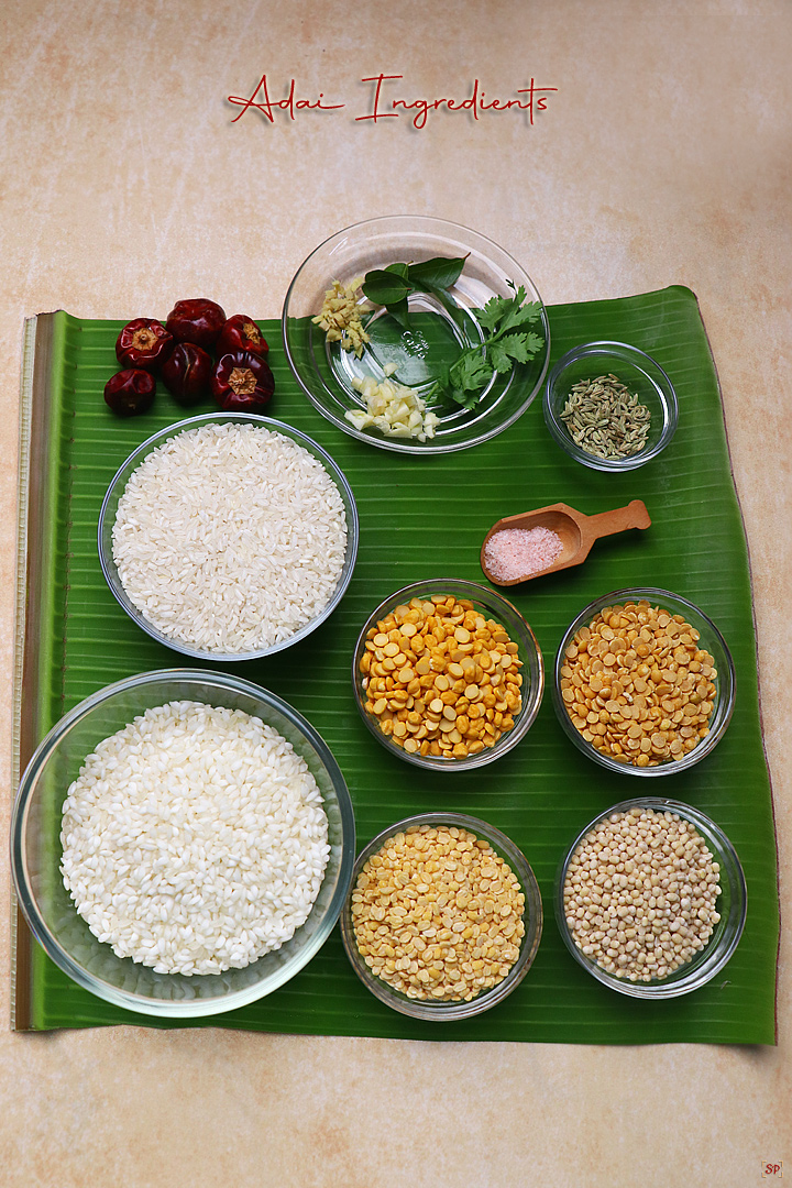 a display of ingredients for making adai or lentil crepes