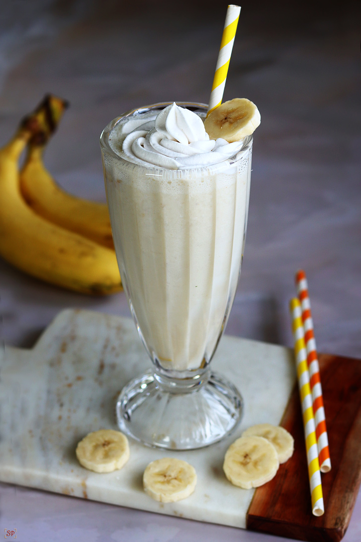 banana milkshake served in a tall glass