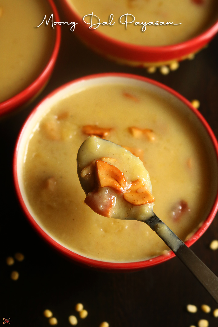 paruppu payasam in a spoon with cashews