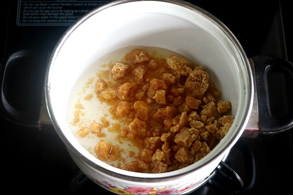 melt jaggery with water