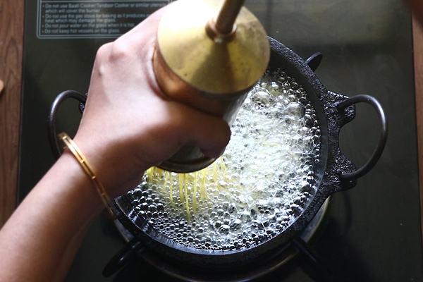 press in hot oil