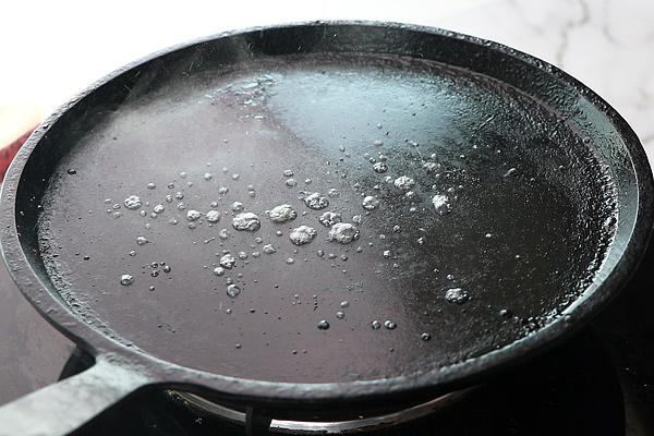 sprinkle water to check if dosa tawa is hot