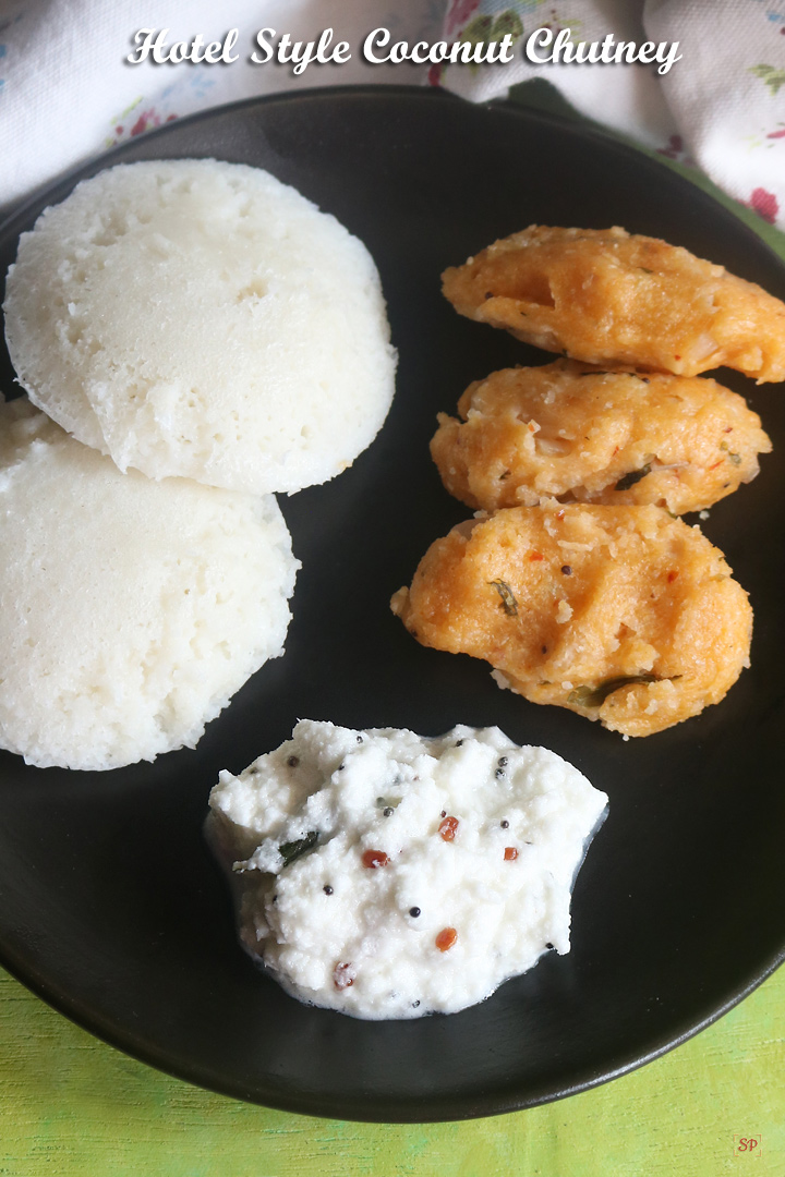 hotel style coconut chutney in a bowl with idli and kozhukattai