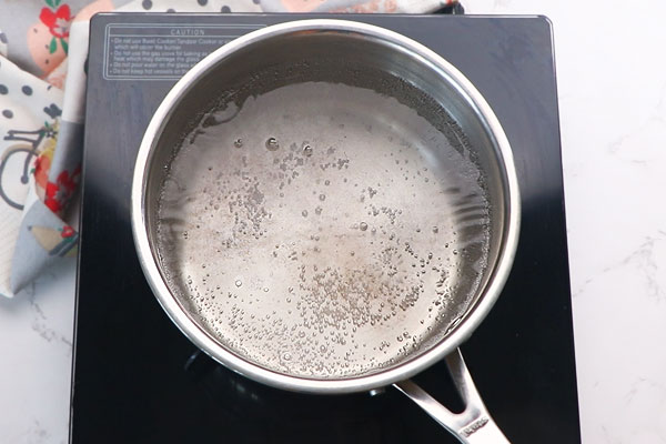 add water and salt to a sauce pan