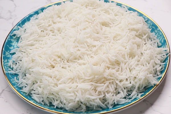 cook basmati rice and spread it to cool