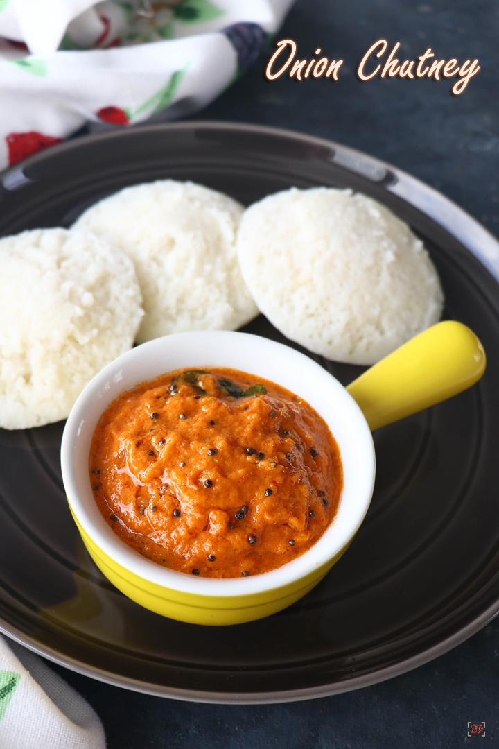 onion chutney in a bowl with idli on the plate