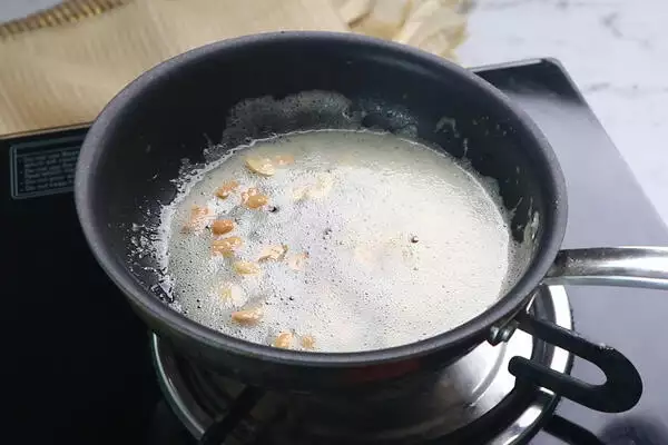 fry cashews in ghee until golden