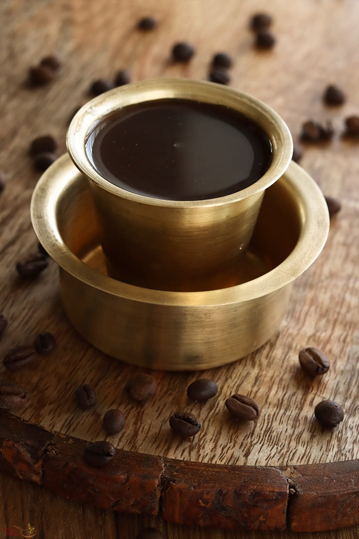 karupatti coffee served in brass davara tumbler