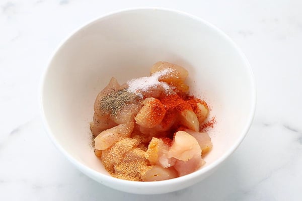 add chicken with spice powders