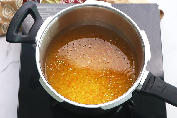 add dal to cooker