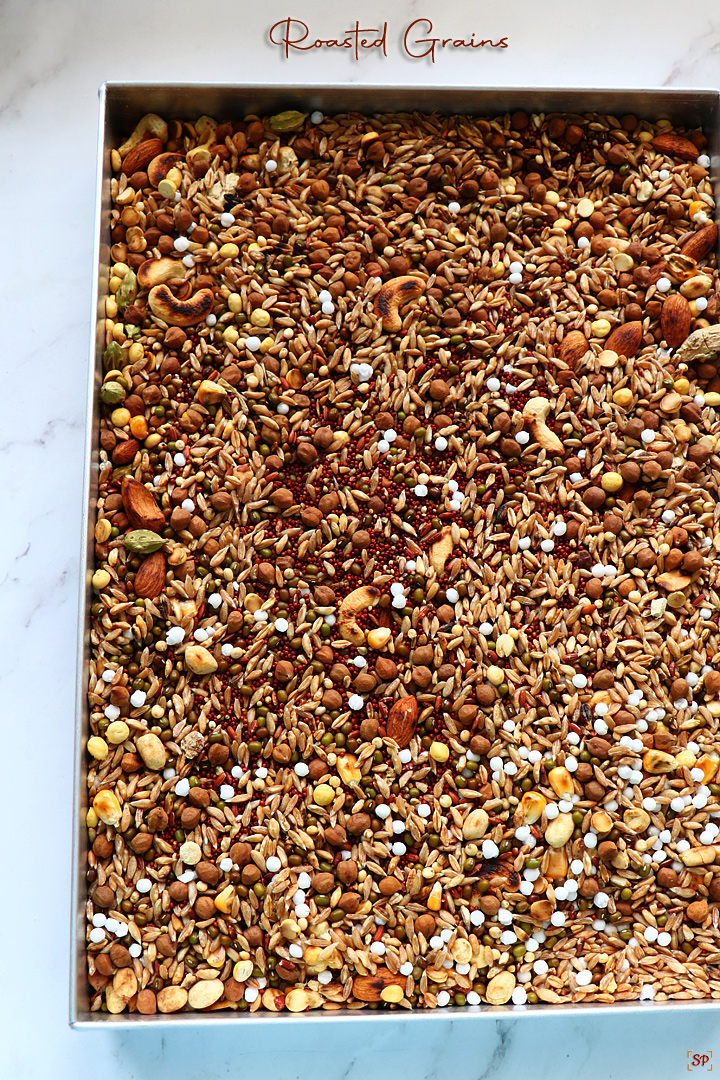 roasted grains spread on a tray