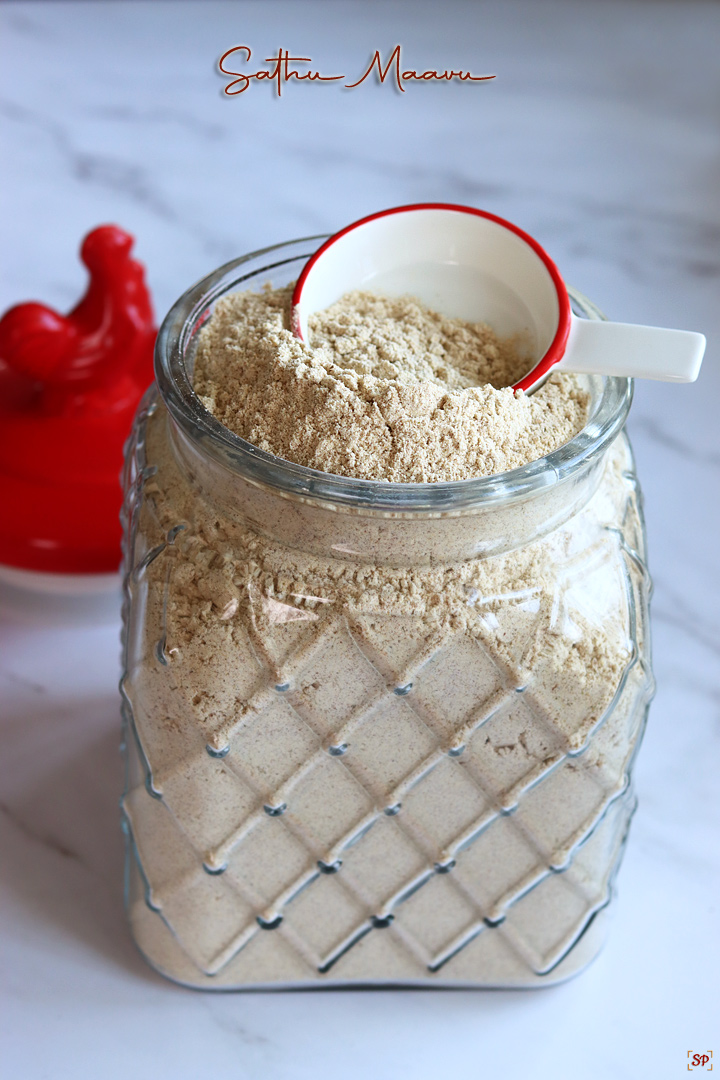 health mix in a glass jar with a red rooster lid