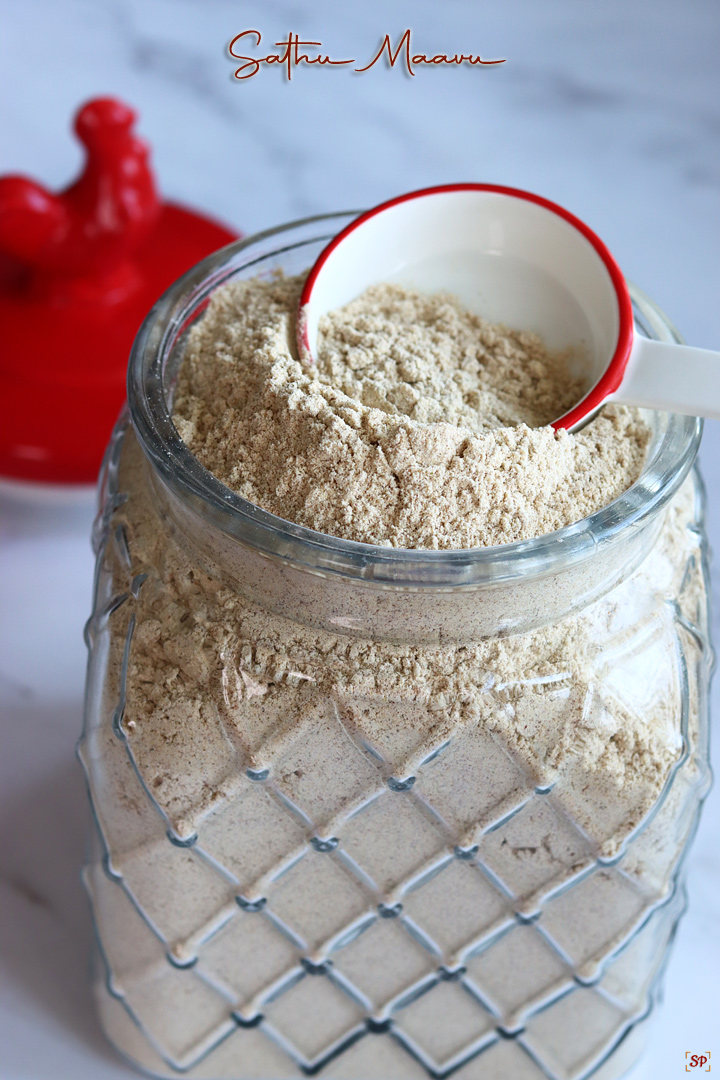 health mix in a glass jar with a red rooster lid