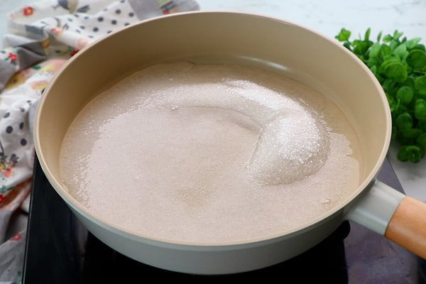 add sugar with water