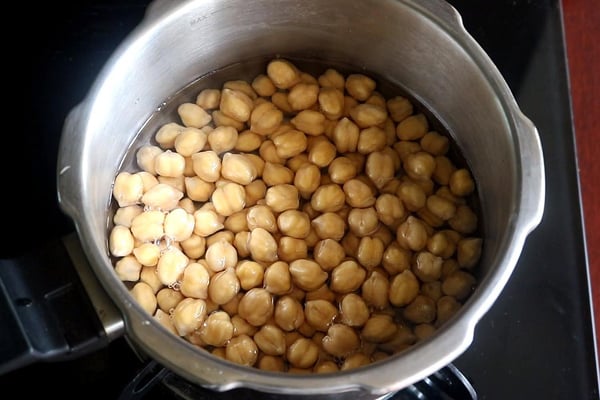 add to cooker with salt, water