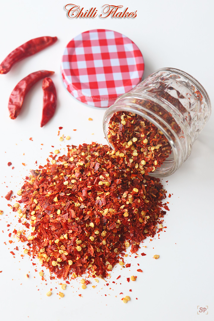 chilli flakes in a glass jar falling off picture