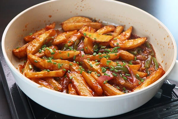 toss well and garnish with spring onion