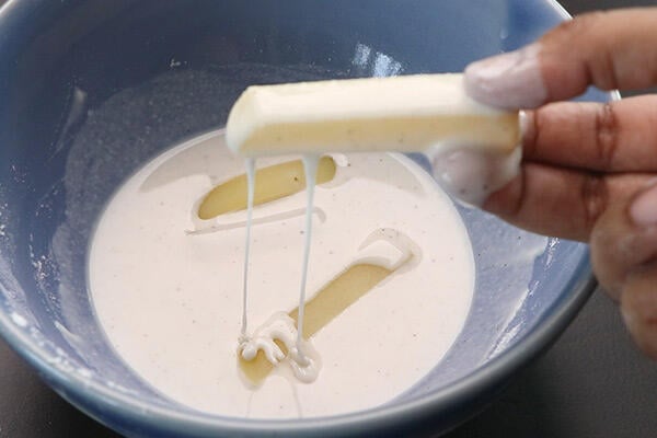 coat the potatoes in the batter