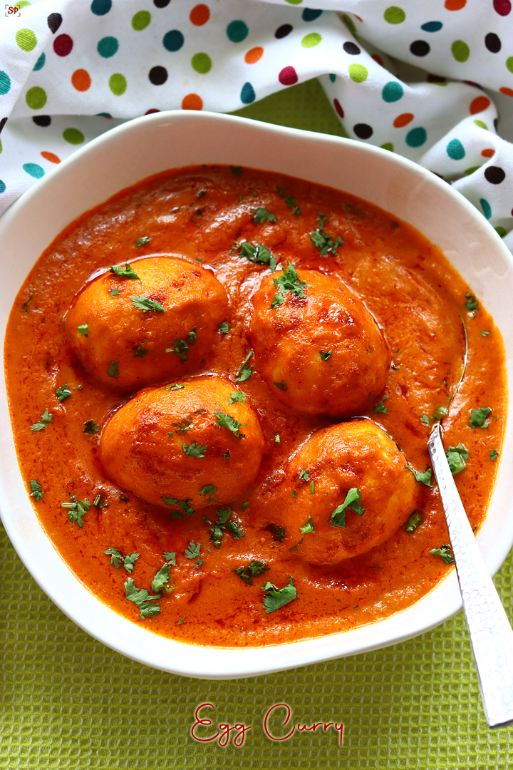 egg curry served in a white bowl