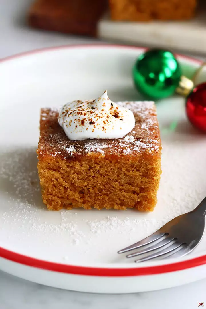 gingerbread cake with whipped cream topping