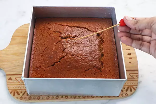 cake in preheated oven