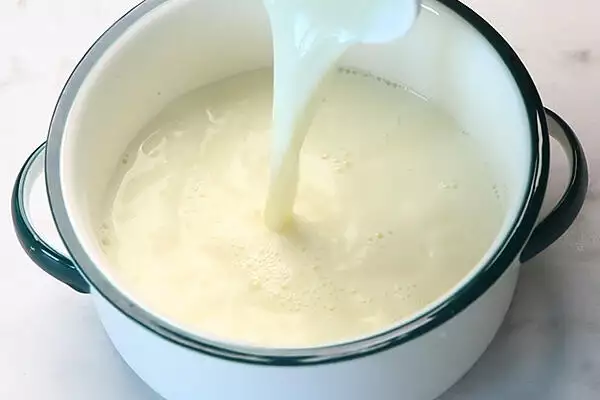 add milk to a mixing bowl