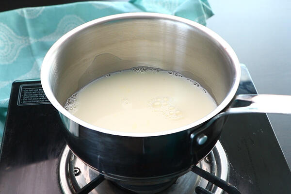 full fat milk is added to sauce pan