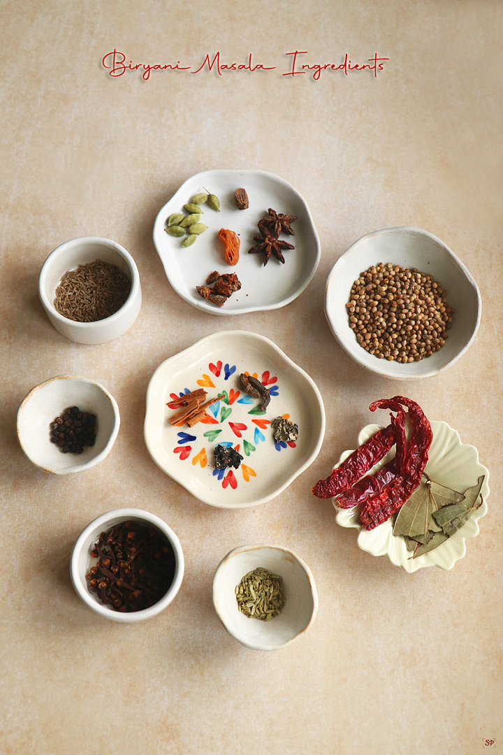 a display showing the ingredients for making biryani masala powder