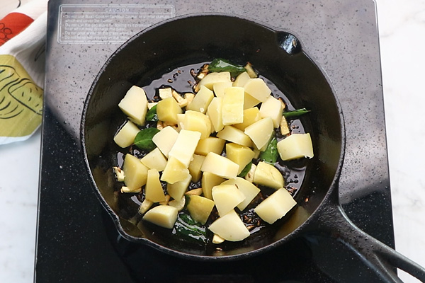 boiled cubed potatoes are added