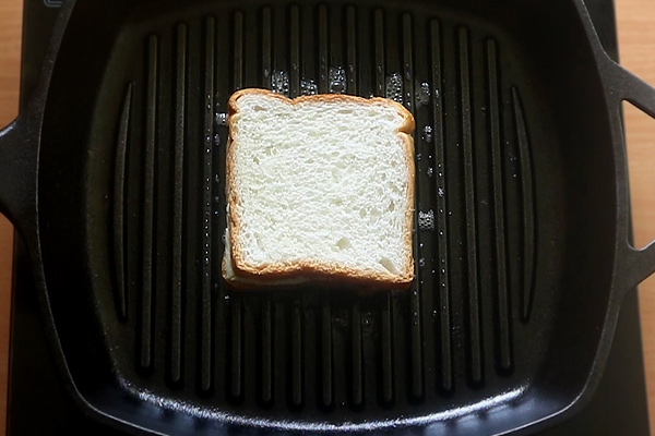 place sandwhich on grill