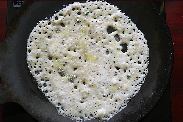 drizzle oil over the dosa