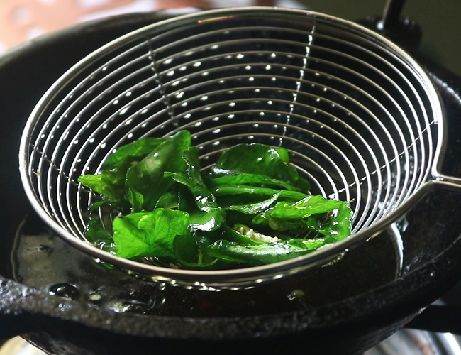 fry curry leaves and green chillies