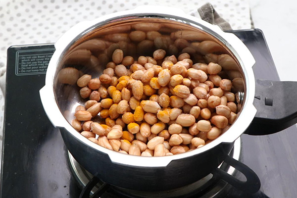 add to cooker with salt, turmeric powder