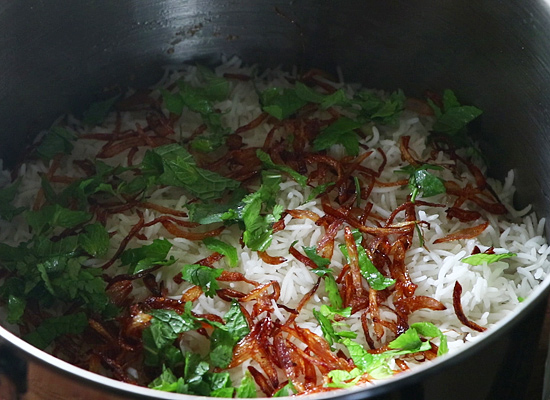 add rice with mint leaves,fried onion