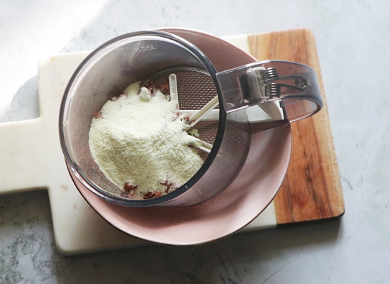 add sugar,coco powder,milk powder to a sieve