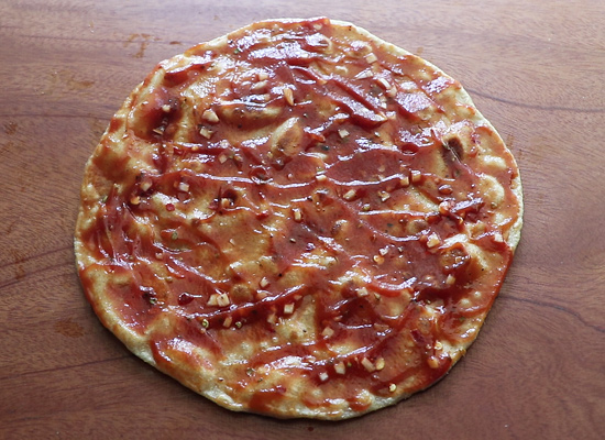 spread the pizza sauce