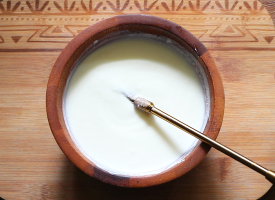 whisk curd until smooth