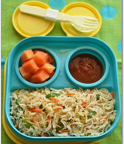 vegetable fried with tomato ketchup and cut papaya