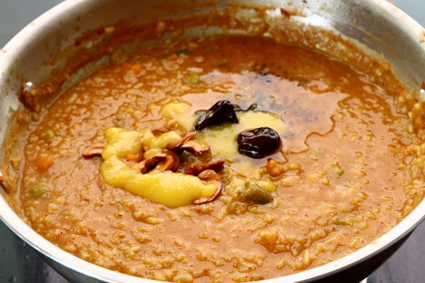 add tempering, cashews with ghee
