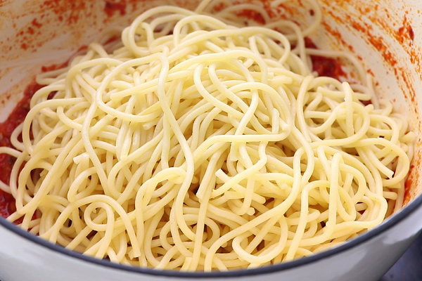 add spaghetti to sauce