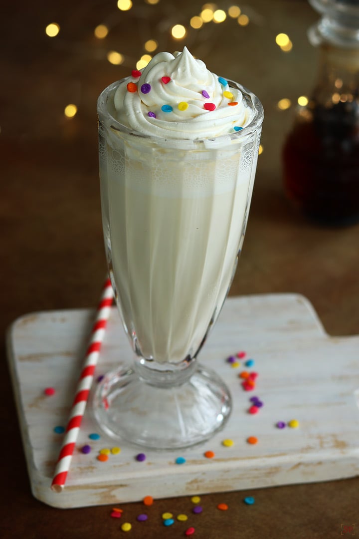 vanilla milkshake served in a tall glass